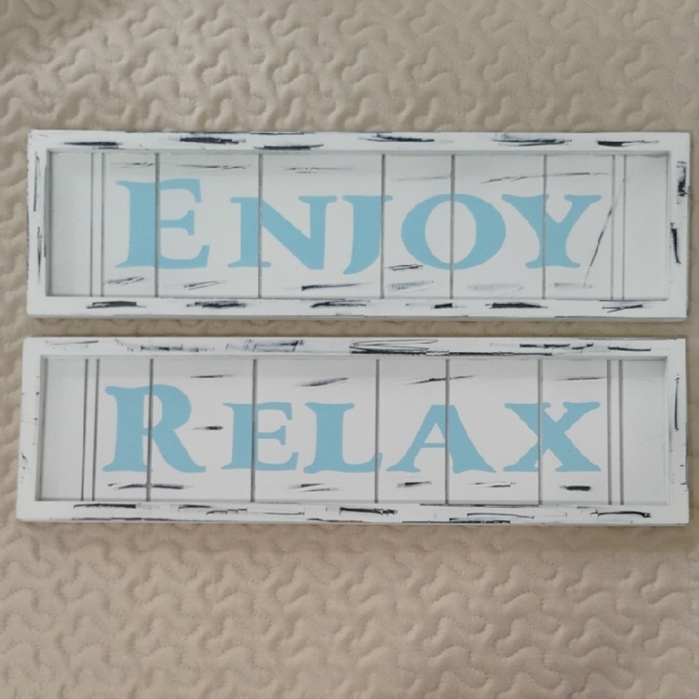 A pair of Enjoy / Relax Wall Signs in Light Blue and White 18 inch x 5 inch